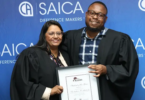 Students holding a graduation certificate
