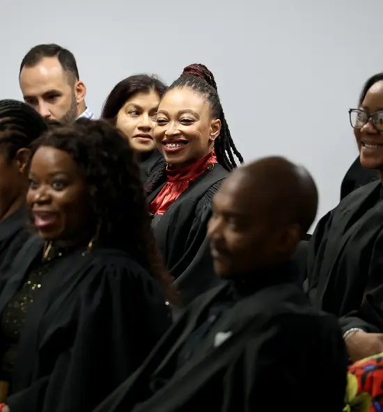 Students at a graduation ceremony.